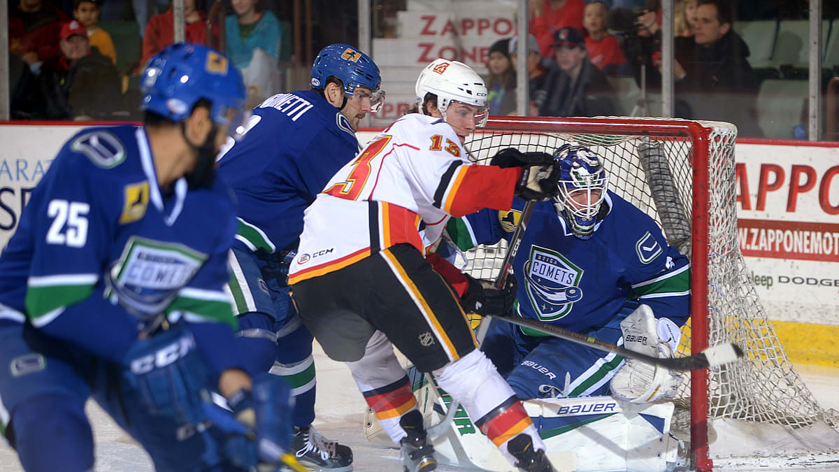 FLAMES DOUSED BY COMETS IN 4-1 DEFEAT